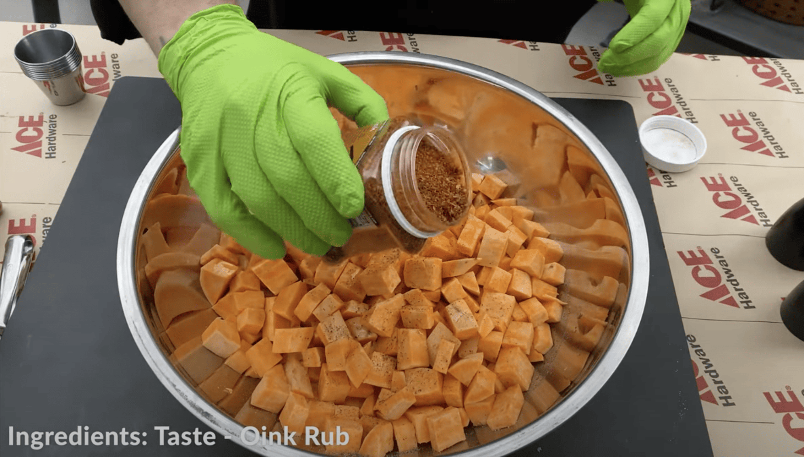 Season the sweet potatoes in a bowl