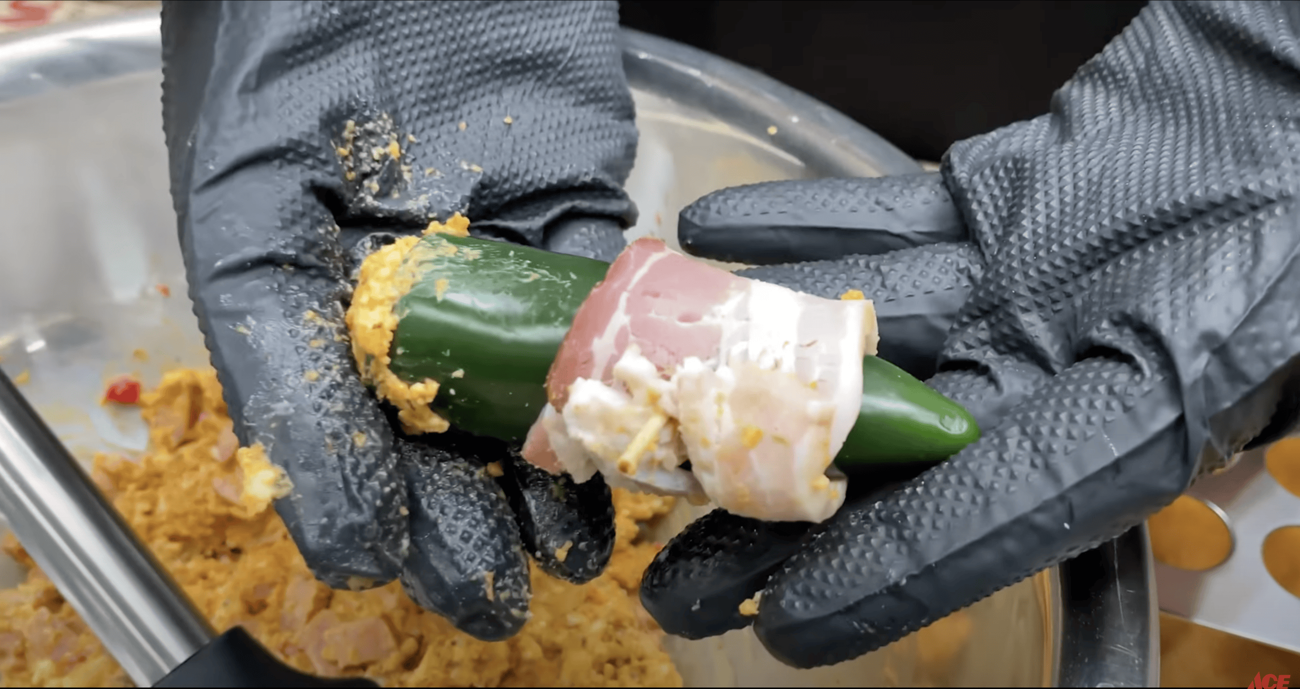 Bacon wrapped around Jalapeño pepper